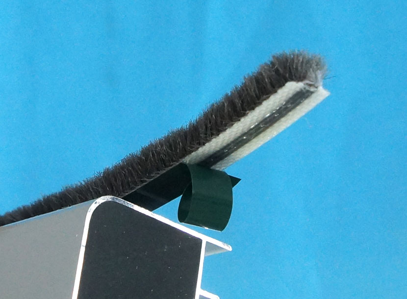 Fin and pile construction shown against a ruler for scale.