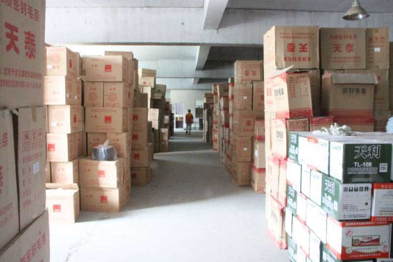 Finished pile weatherstrip in cartons, stacked in the plant warehouse